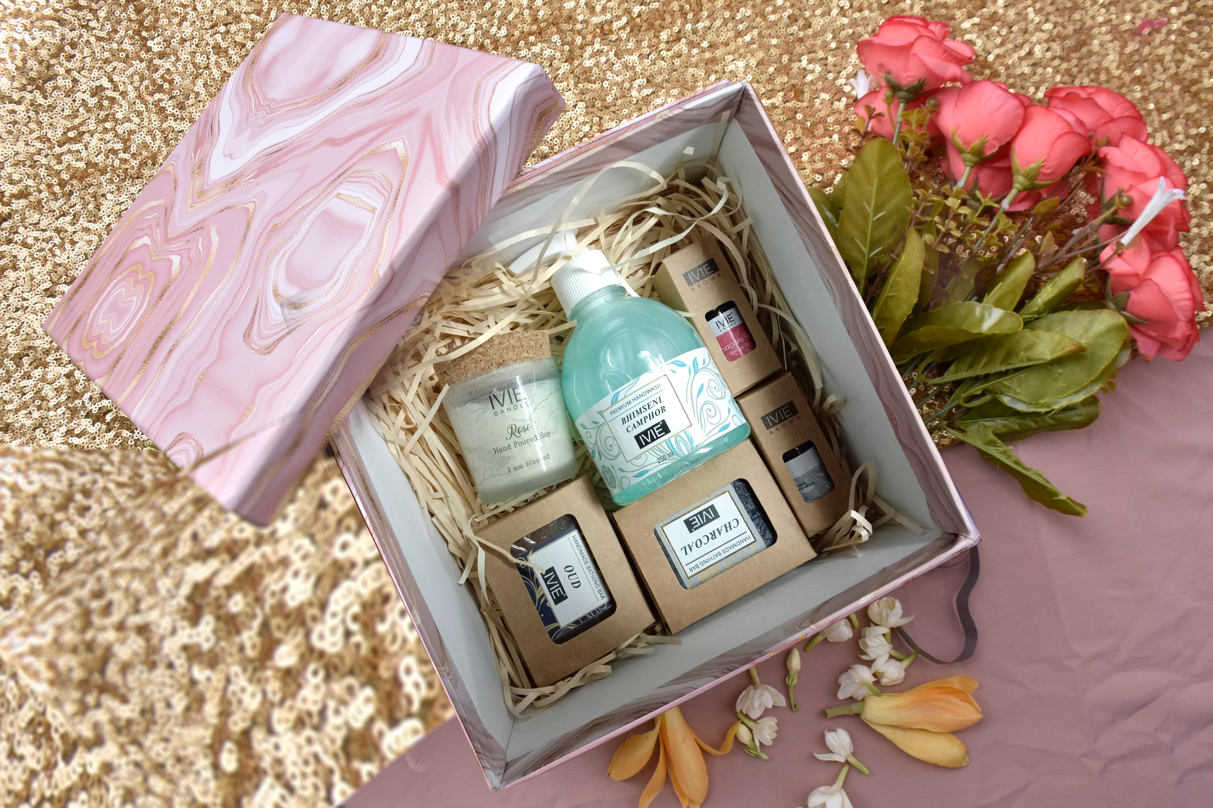 IVIE Gift Hamper 2 [ Oud Handmade Soap , Charcoal Handmade Soap , Aroma Mohagany Diffuser Oil , Aroma Venilla Berry Diffuser Oil , Bhimseni Handwash , Candle - Rose ]